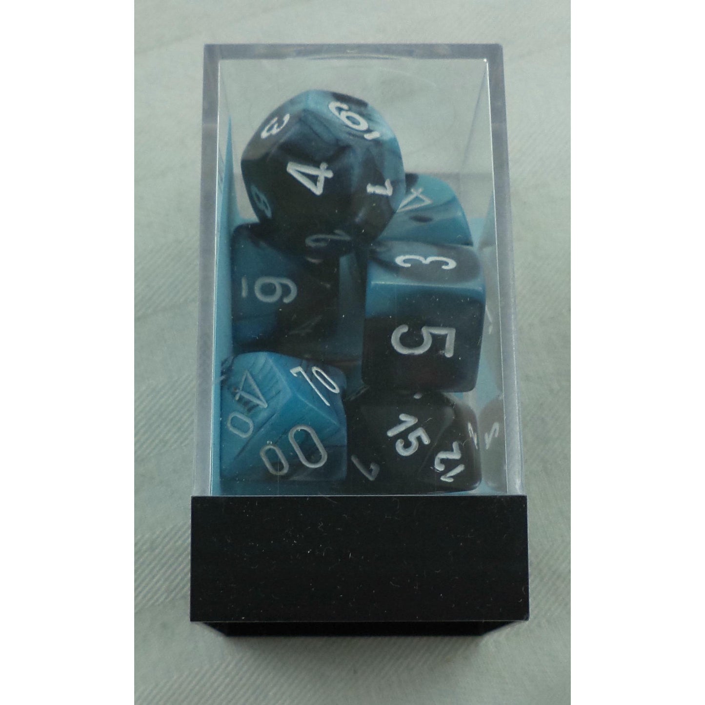 Image of Chessex Gemini Black/Shell Dice w/White Markings 7-Dice Set D20/12/10/%/8/6/4