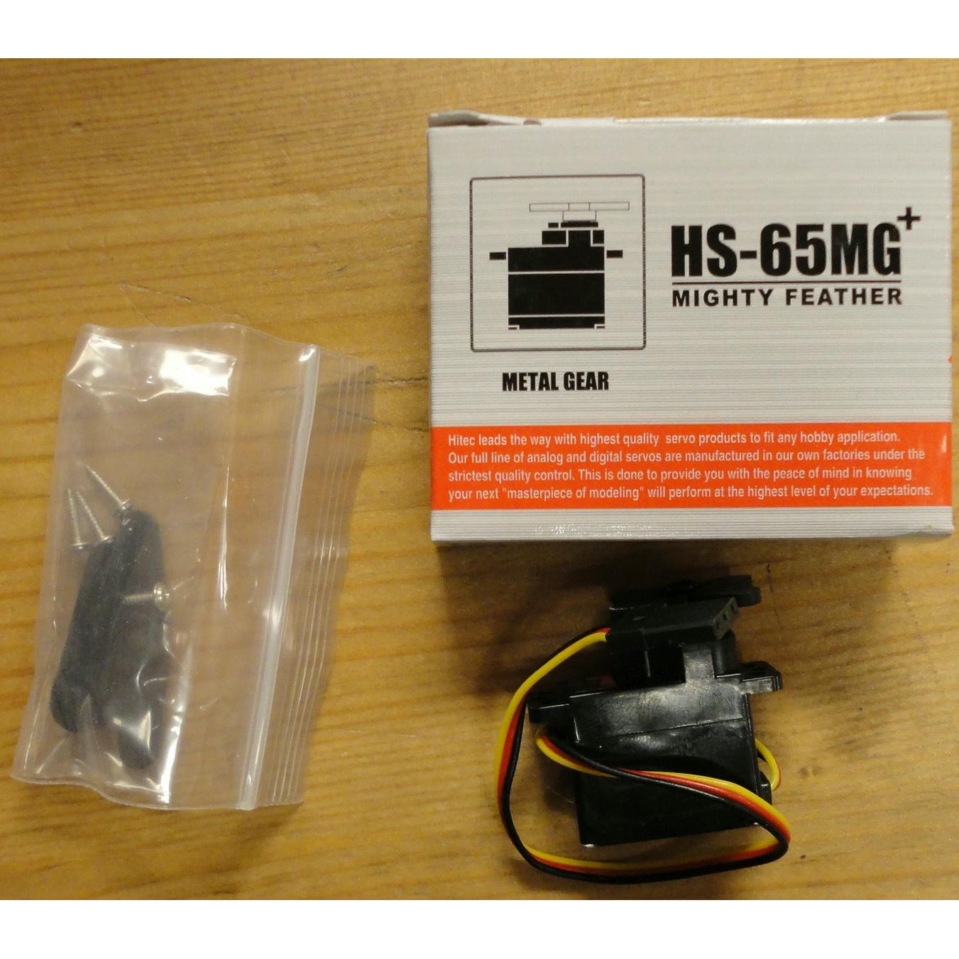 Image of Hitec HS-65MG Mighty Feather Servo (30.55oz, .11s, MG)