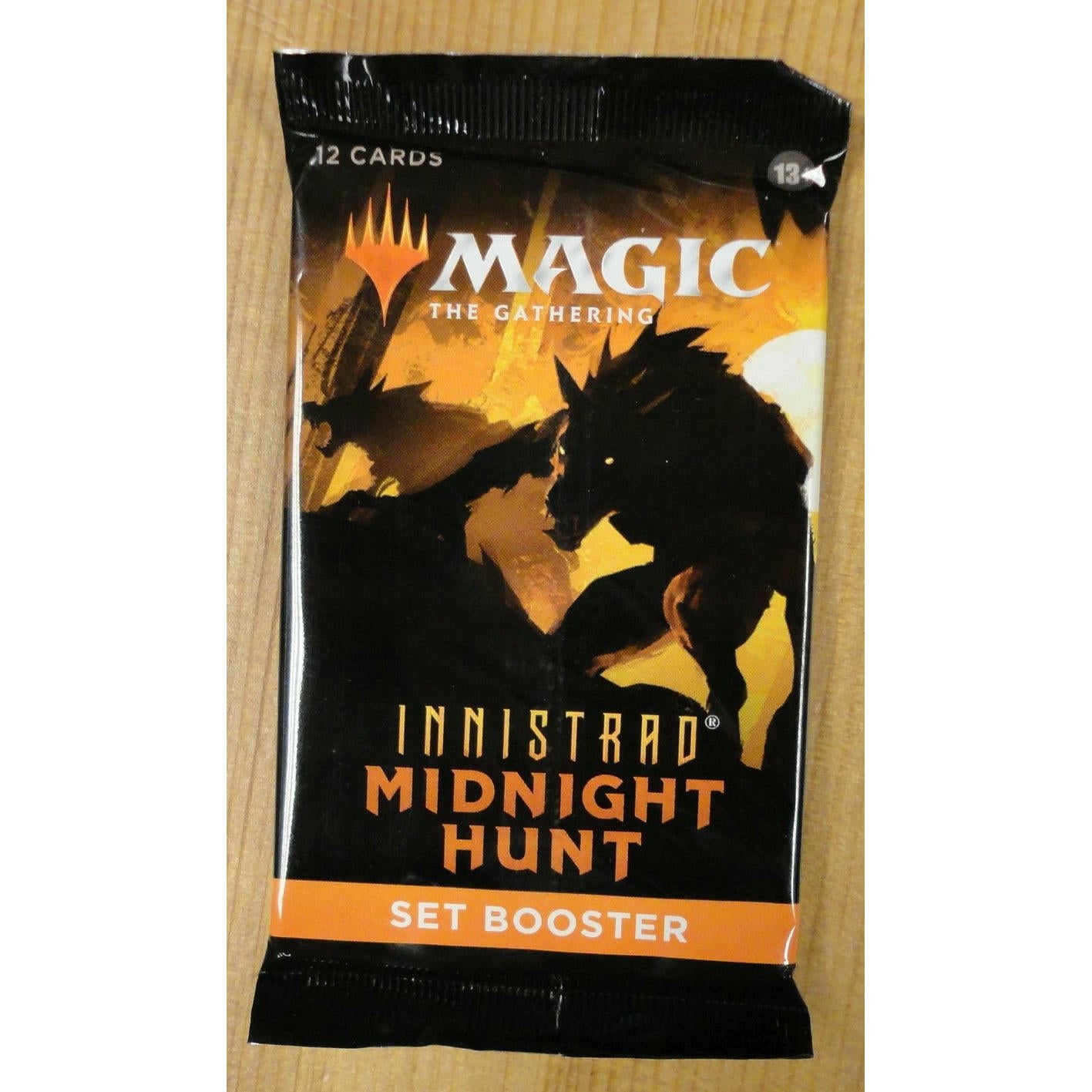 Image of Magic The Gathering Innistrad Midnight Hunt 12-Card Set Booster Pack